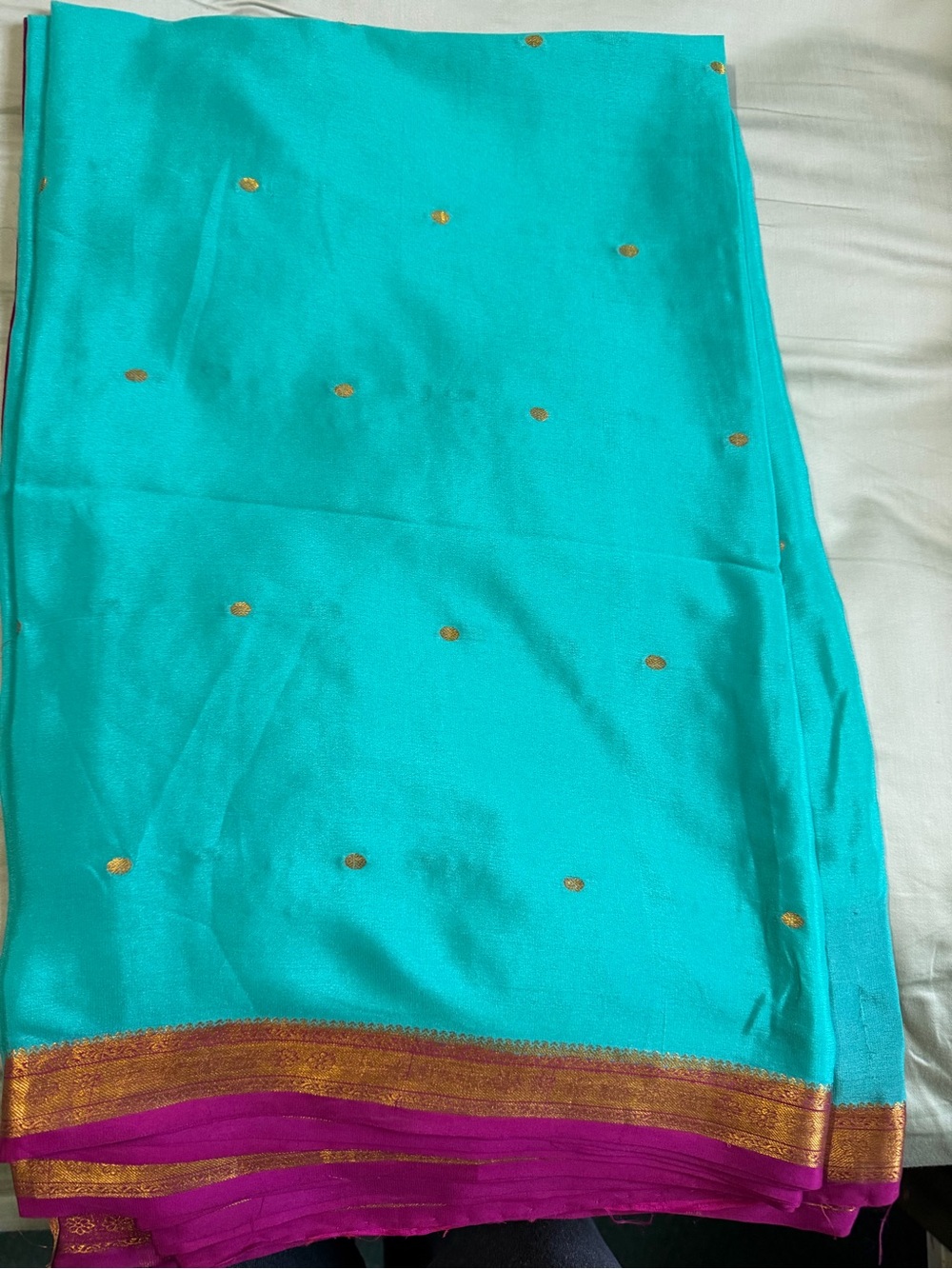 Turquoise Embellished Women’s Saree with Magenta & Gold Woven Border